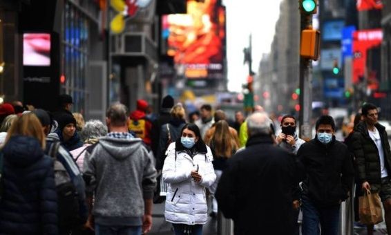X87491405 Tourists With Protective Face Masks Walk Through Times Square On March 13 2020 In New Y Jpg Pagespeed Ic 2adquqq W.jpg 1718483347