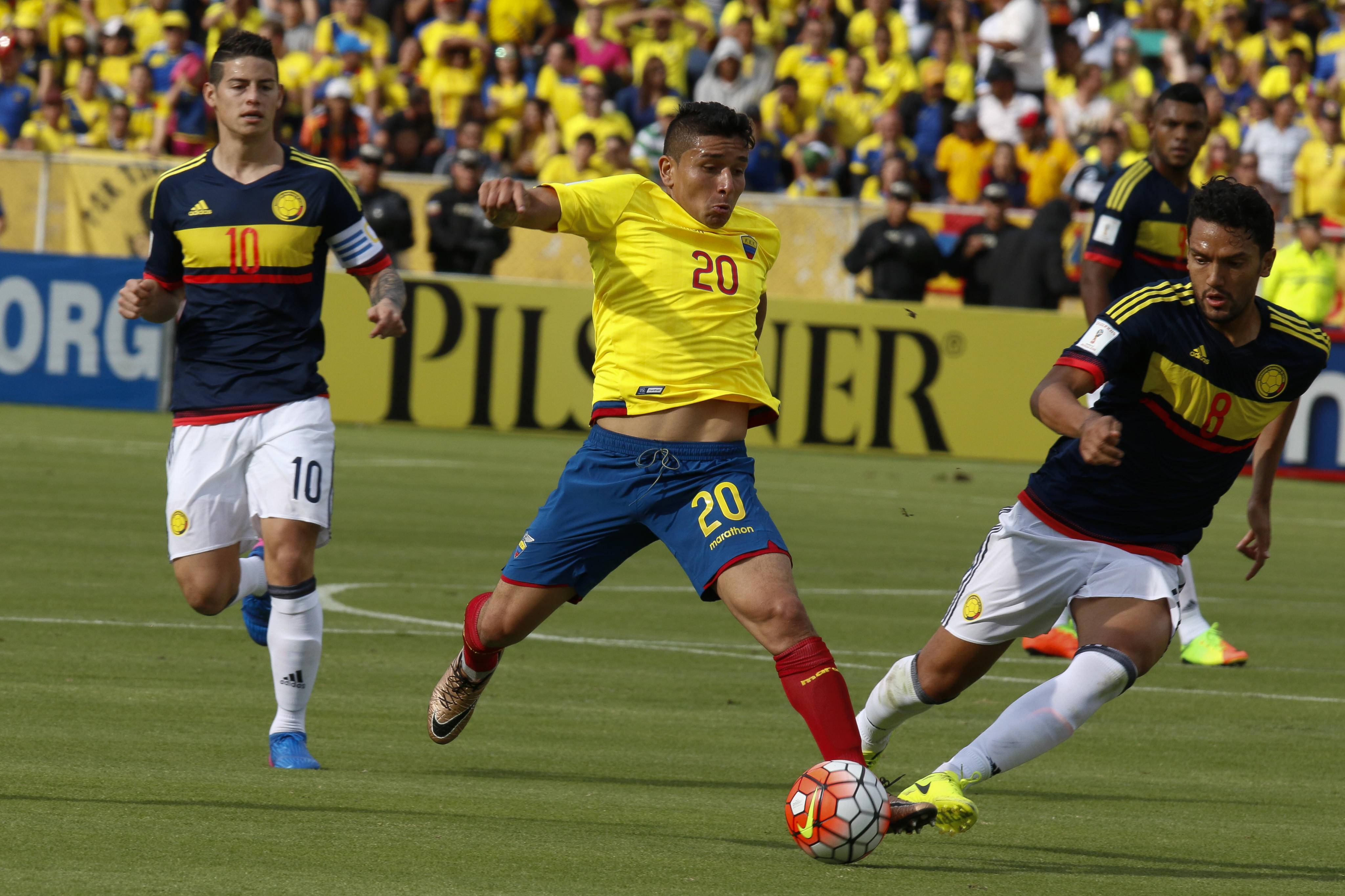 Ecuador S Mario Pineida C Vies For The Ball With James Rodriguez L And Abel Aguilar Of Colombia