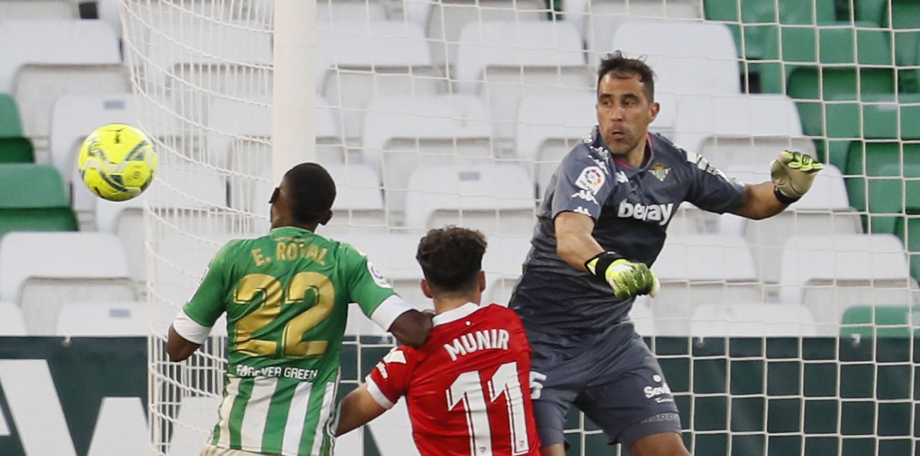 Betis Goalkeeper Claudio Bravo (r) In Action During The Spanish Laliga Soccer Match Between Real Betis And Sevilla Fc A